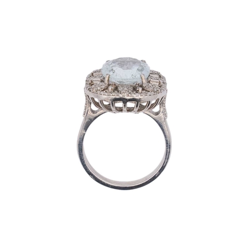 139 - An ornate silver aquamarine and diamonds set dress ring. The ring head is 2.2cm x 1.8cm, stamped 925... 