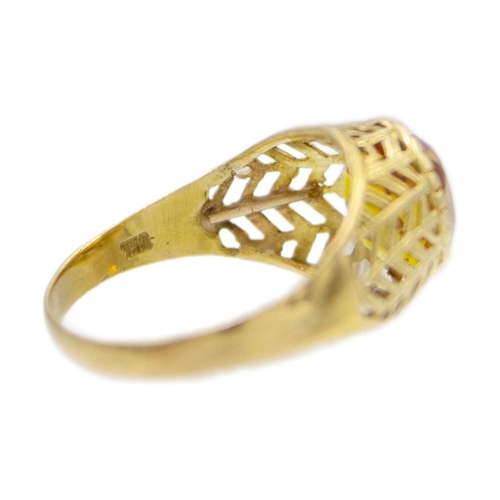 152 - An 18k gold synthetic yellow sapphire set ring. Stamped 750, the ring size Q, total weight 2.5g. Sli... 