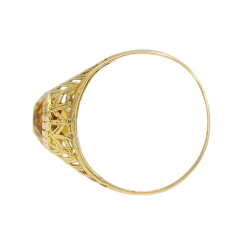 152 - An 18k gold synthetic yellow sapphire set ring. Stamped 750, the ring size Q, total weight 2.5g. Sli... 