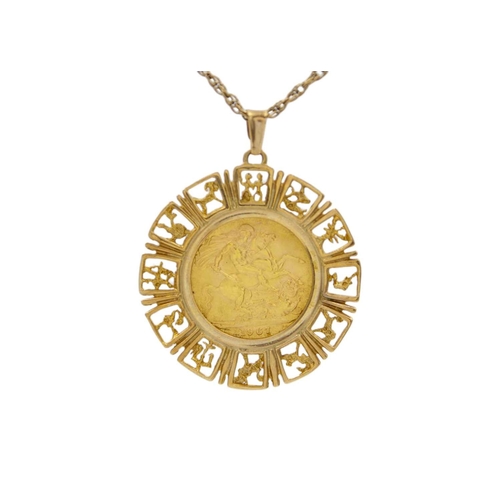 158 - A 1967 full sovereign gold coin 9k mounted zodiac pendant necklace. The sovereign in a cast pierced ... 