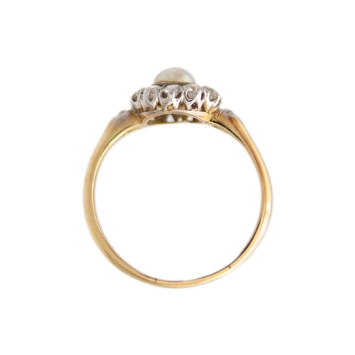 17 - A high purity gold pearl and diamond cluster ring. The cultured pearl is 5.6mm in diameter, surround... 