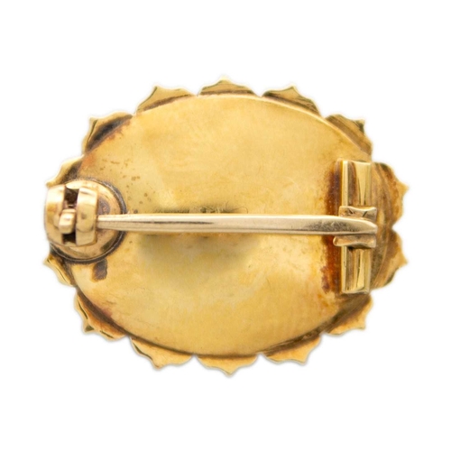 18 - An apple-green chrysoprase and split pearl cluster brooch set in high purity gold. An oval cabochon,... 