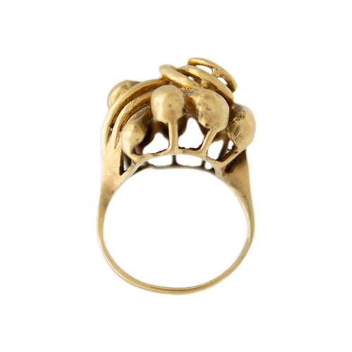 22 - An 18k sinuous design ring. Stamped 319AL 750, size M 1/2, 10.3g.