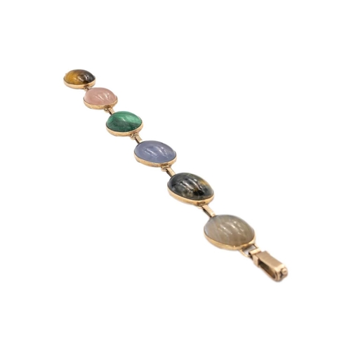 32 - A 9k rose gold bracelet set with various quartz gems. Each oval cabochon gem in a closed back settin... 