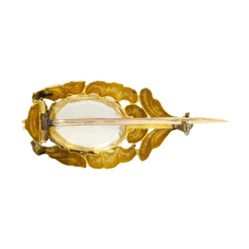 4 - A Victorian high-purity citrine set brooch. Embossed decoration, height 2.7cm, width 1.4cm, the oval... 