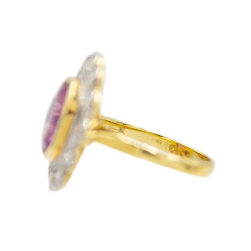 51 - A fine pink spinel and diamond ring. The spinel is 4.5ct approx., surrounded by twelve round brillia... 