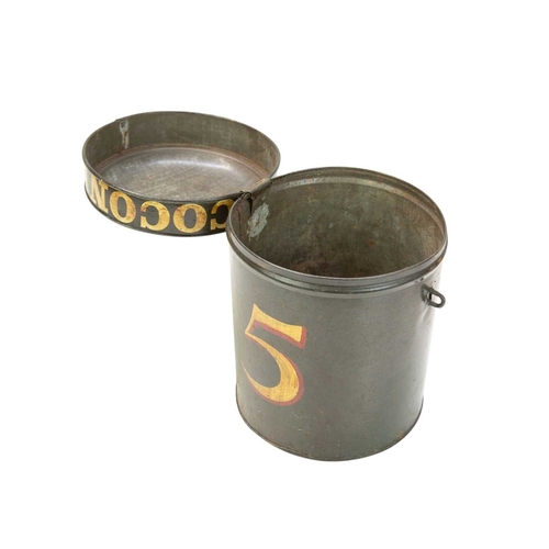 12 - A painted toleware tobaccanist's canister. 'Ogden's Coconut', 5, height 24cm. In our opinion this ca... 