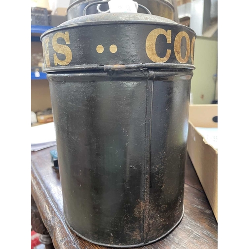 12 - A painted toleware tobaccanist's canister. 'Ogden's Coconut', 5, height 24cm. In our opinion this ca... 