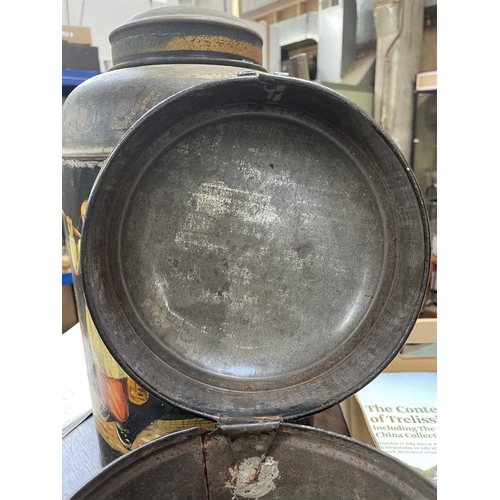 12 - A painted toleware tobaccanist's canister. 'Ogden's Coconut', 5, height 24cm. In our opinion this ca... 