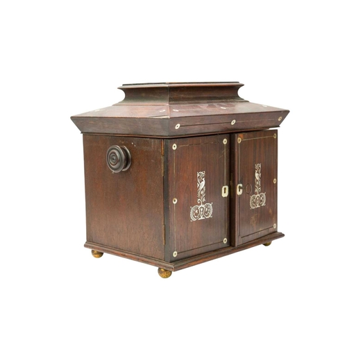 16 - A rosewood and mother of pearl inlaid work box. 19th century, with a hinged top opening to a silk-li... 