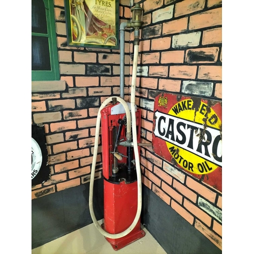37 - ± A hand cranked petrol pump from Flambards Garage. Height 200 cm. Please note that all lots in this... 