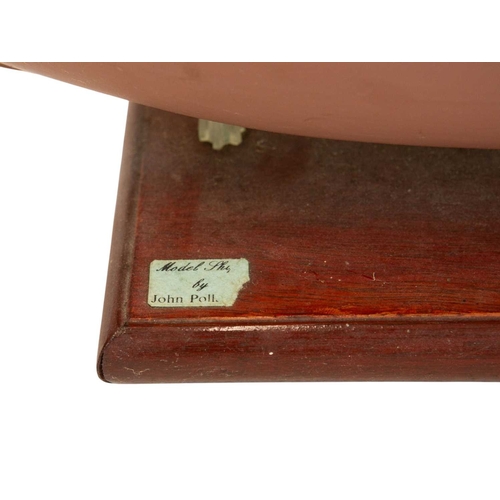 38 - A rigged model sailboat. By Cornish modeller John Pollard, on a wooden stand, height 96cm.