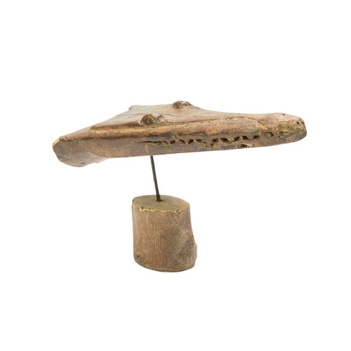 43 - A carved hardwood crocodile canoe prow. Papua New Guinea, length 49cm, on a later stand.