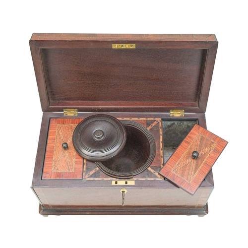 55 - A George III mahogany and inlaid tea caddy. The chequer strung lid with central flower urn inlay, in... 