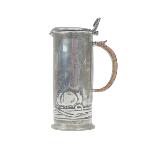 56 - A Liberty & Co pewter lidded jug. Designed by Archibald Knox, cast with a stylised fruit, the thumbp... 