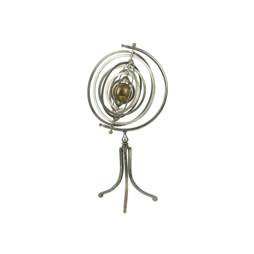 107 - A Copernican armillary sphere. 20th century, the central brass sphere within nine polished steel hoo... 
