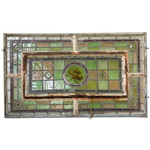 117 - A collection of leaded stained glass panels. Late 19th century in need of restoration, various shape... 