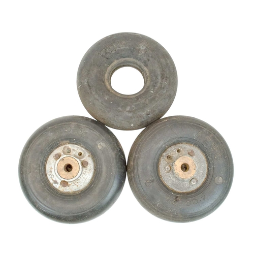 128 - Two WWII RAF Hurricane aircraft tail wheels. The aluminium hubs stamped with serial and other number... 