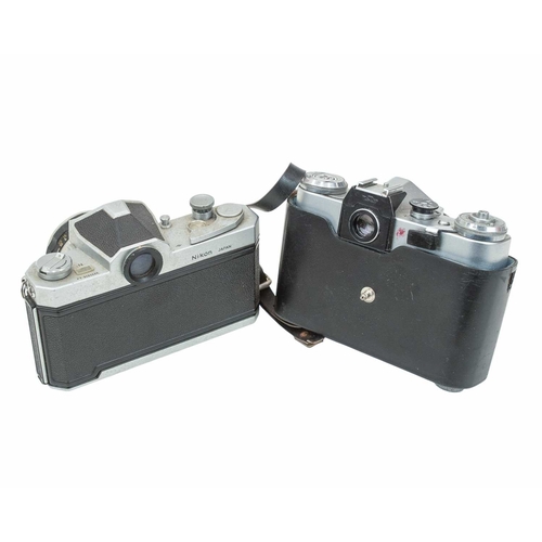 141 - A Nikon FTN Nikkormat SLR camera. Serial number FT 3522622, with a Nikkor-H 1:2 f=50mm lens, togethe... 