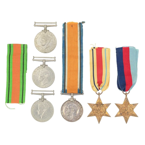 143 - A WWII group of four medals. 1939-1945 Star, Africa Star, Defence and War medals, together with anot... 