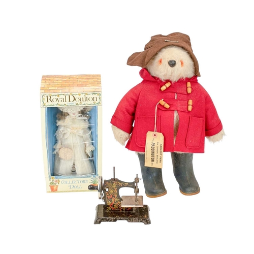 154 - A Gabrielle Designs 'Paddington Bear' teddy. With red duffel coat, brown hat and dark blue wellingto... 