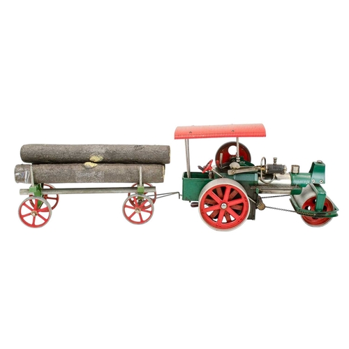 162 - An early Mamod TE1 steam traction engine. With red paint work, together with a Mamod steam roller, a... 