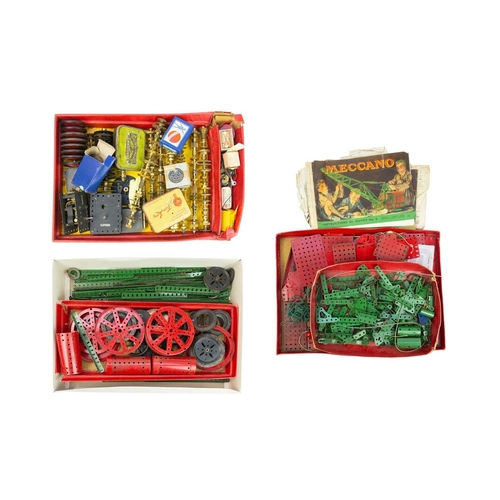 167 - A collection of Meccano in three trays. Including wheels, cylinders, motors, gears, instruction manu... 