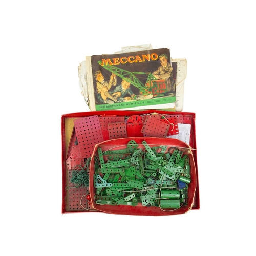 167 - A collection of Meccano in three trays. Including wheels, cylinders, motors, gears, instruction manu... 