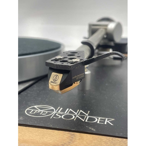 191 - A Linn Sondek LP12 turntable. Walnut base, with perspex lid, height 17cm, width 44cm, depth 35cm. Th... 