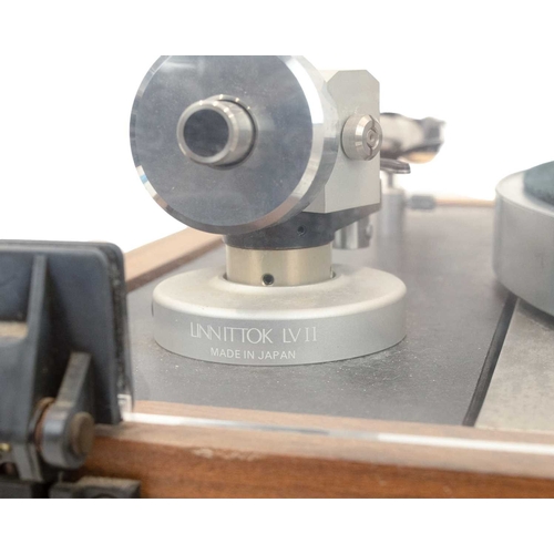 191 - A Linn Sondek LP12 turntable. Walnut base, with perspex lid, height 17cm, width 44cm, depth 35cm. Th... 
