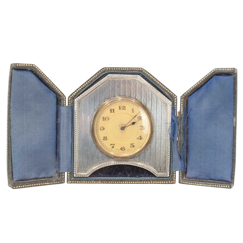 193 - A hallmarked silver travel clock. With an 8 day Swiss made movement, hallmarked for Williams Ltd Bir... 