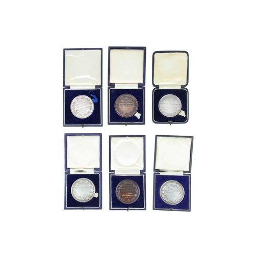 196 - The Worshipful Company of Carpenters, three silver presentation medals. All awarded to Henry Wallbri... 