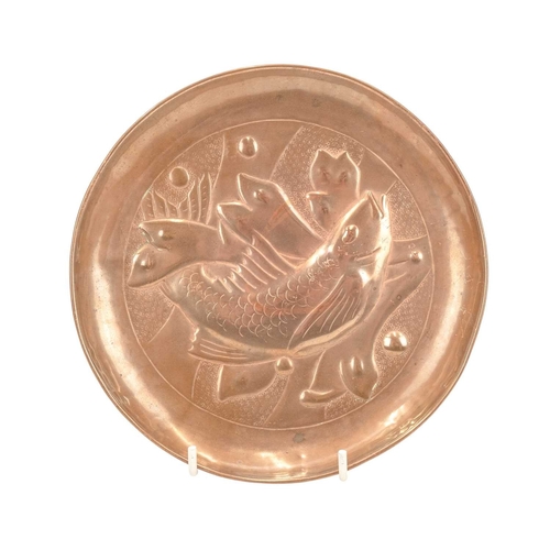 199 - A Newlyn copper small circular dish. Repousse decorated with a fish and seaweed, apparently unmarked... 