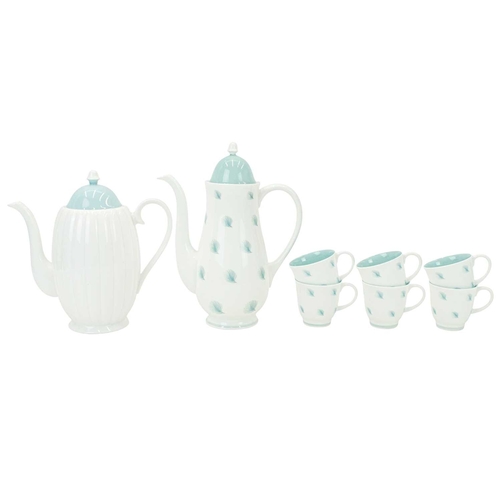 227 - A collection of Susie Cooper ceramics. In various patterns, including 'One O'Clocks', 'Whispering Gr... 