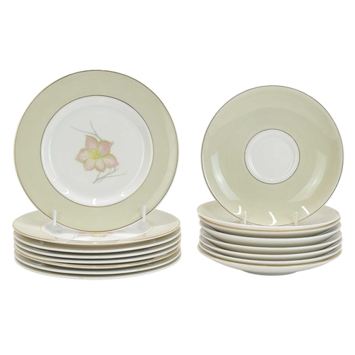 229 - A large collection of Susie Cooper ceramics. In various designs including 'Day Lily', 'Gardenia', 'S... 