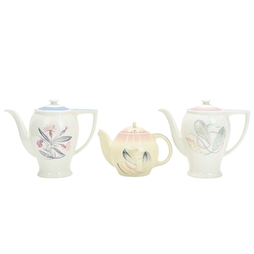 229 - A large collection of Susie Cooper ceramics. In various designs including 'Day Lily', 'Gardenia', 'S... 