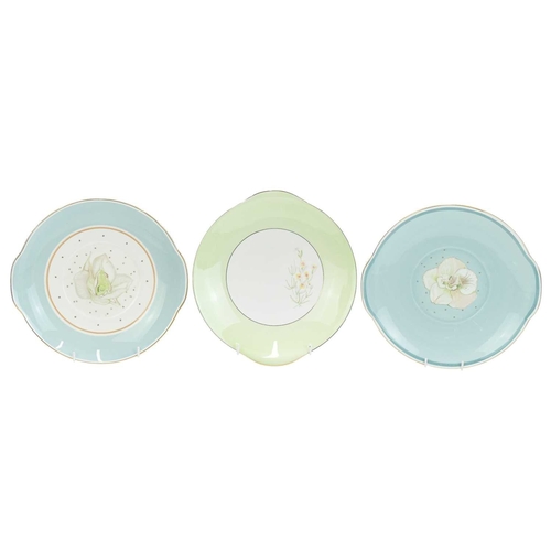 229 - A large collection of Susie Cooper ceramics. In various designs including 'Day Lily', 'Gardenia', 'S... 