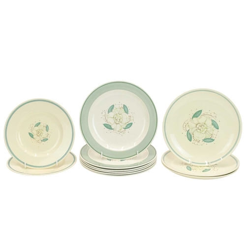 229 - A large collection of Susie Cooper ceramics. In various designs including 'Day Lily', 'Gardenia', 'S... 