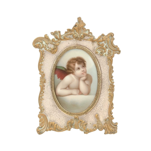23 - A late 19th/early 20th century German porcelain plaque. Hand painted with a cherub after Raphael, an... 