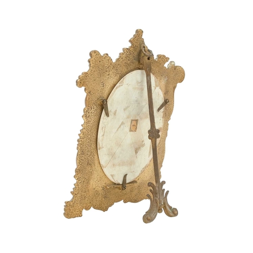 23 - A late 19th/early 20th century German porcelain plaque. Hand painted with a cherub after Raphael, an... 