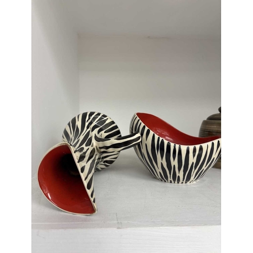 230 - Beswick 'Zebrette' ceramics. Circa 1950s, designed by James Hayward and Albert Hallam, includes a 13... 