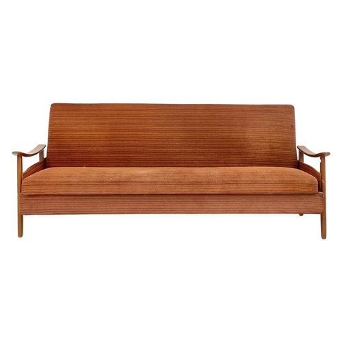 232 - A mid-century sofa bed. With stained beech framed arms and feet, height 79cm, width 193cm, depth 74c... 
