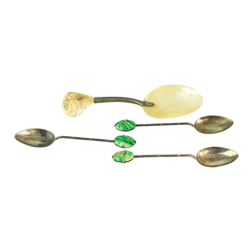 233 - An Art Nouveau WMF centrepiece bowl. An ombre green glass frilled edge dish, contained within a silv... 