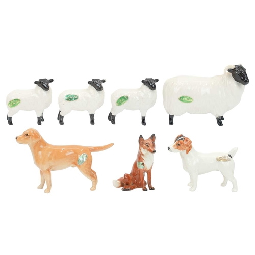 270 - Beswick. A collection of animals to include 'Golden Labrador', 'Jack Russell Terrier', 'Black-Faced ... 