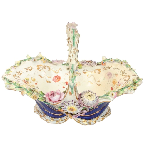 275 - A Coalport Coalbrookdale porcelain basket. Circa 1810-1825, in a striking cobalt blue glaze, encrust... 