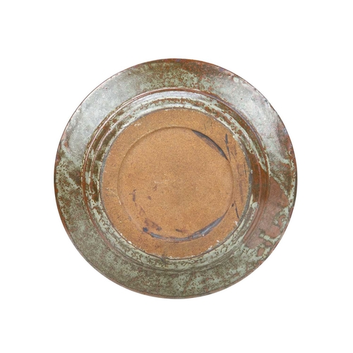 292 - A large studio pottery platter. Unmarked, diameter 40.5cm, together with a John Lomas iron glazed po... 