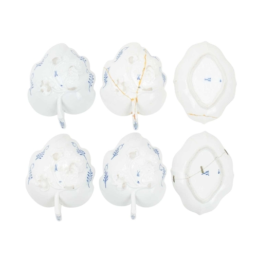 298 - A set of Four Meissen blue and white onion pattern leaf shape sweetmeat dishes.. 19th century, the b... 