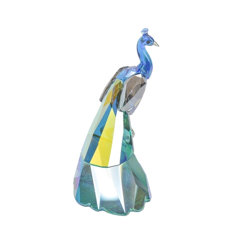 299 - A Swarovski Crystal peacock. Designed by Elisabeth Adamer for the Swarovski Crystal Society (2013 An... 