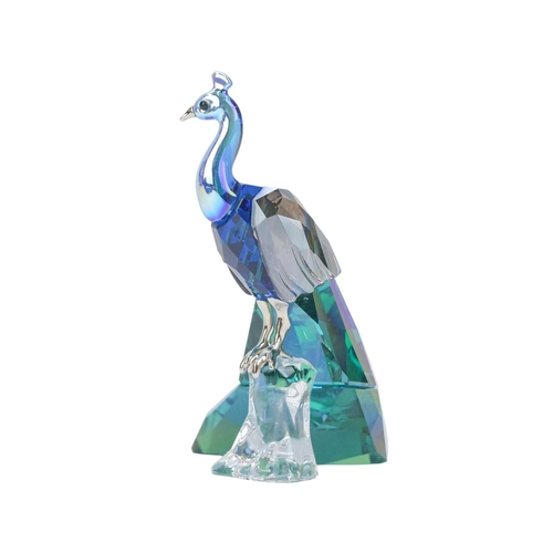 299 - A Swarovski Crystal peacock. Designed by Elisabeth Adamer for the Swarovski Crystal Society (2013 An... 