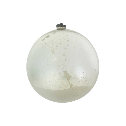 302 - A large witches' ball. 19th century, mercury glass with top metal hanger, diameter approx 25cm.